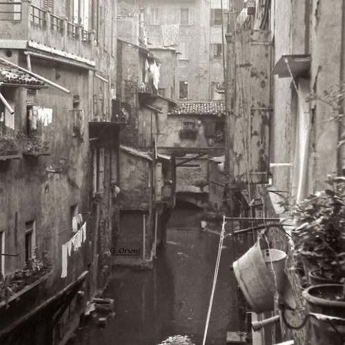 Immagine del Guazzatoio in cui si vede sullo sfondo via Malcontenti ancora con i paramenti e i servizi pubblici, Collezione privata di Gilberto Orsoni.